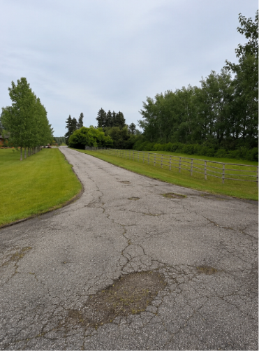 Acreage Asphalt Lane before